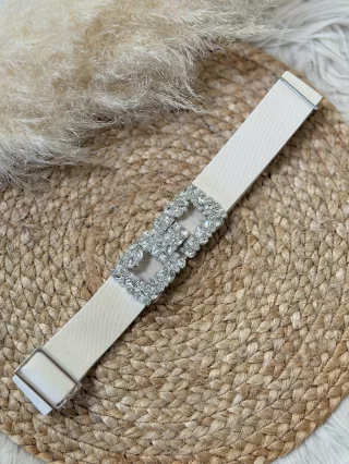   Curea strălucitoare, elastică, cu mărime reglabilă, decorată cu pietre