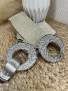 Curea elastică, strălucitoare, decorată cu pietre