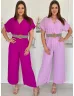   Salopetă lejeră, cu talie elastică, petrecută, din material neelastic, cu curea. (Recomandată pentru mărimile S-L.)