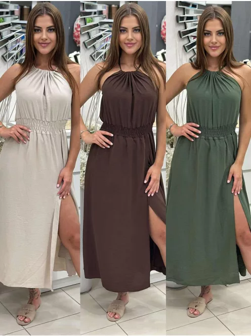 Rochie lejeră, cu elastic în talie, reglabilă la gât cu șnur, crăpată, din material neelastic. (Recomandată pentru mărimile S-L.)