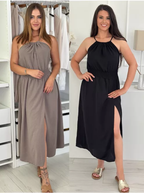 Rochie lejeră, cu elastic în talie, reglabilă la gât cu șnur, crăpată, din material neelastic. (Recomandată pentru mărimile S-L.)